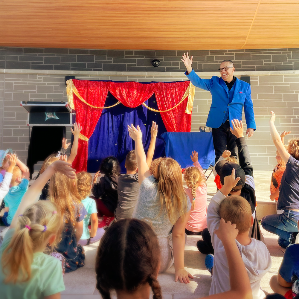 Magic act event at Legacy Square Bandshell